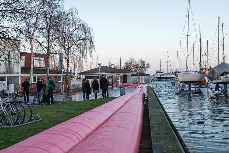 PVC pink pipes on a riverside